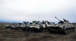 Azerbaijani armored vehicles begin test-fire on frontline